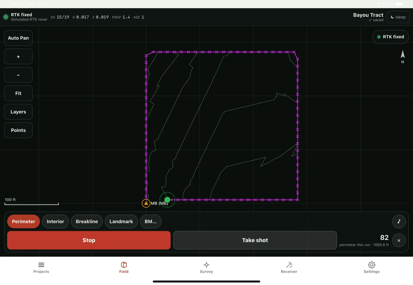Collector on an iPad, Field tab: a dark map with the magenta perimeter ring recorded so far, natural contours forming inside it, the master benchmark marked MB, the rover as a green disc, a north arrow and a 100 ft scale bar; Auto Pan, zoom, Fit, Layers and Points down the left; a green RTK fixed pill top right; and the survey dock along the bottom with the mode chips, a red Stop, Take shot and the count — 82 perimeter points this run over 1,065.8 ft.